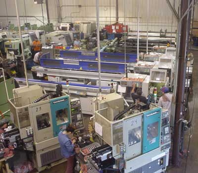 Multi axis(forground), and Swiss machines (rear)  in photo